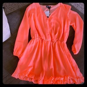 Coral lace Romper NWT never been worn